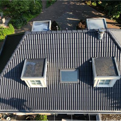 Coaten sneldekpannen dak – donker antraciet – Huybergen - Marco Kachelservice